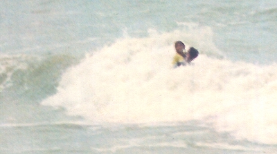 Christopher and Jiji in the waves